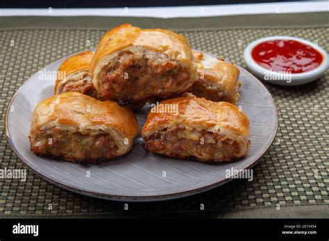 Mini sausage rolls Stock Photo - Alamy