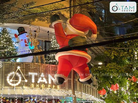 Mô hình ông già noel leo tường cao 2 3m bơm hơi tự động Vải dày Bơm