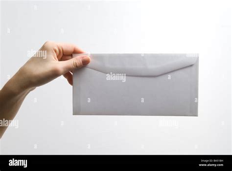 Holding An Envelope Hi Res Stock Photography And Images Alamy