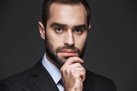 Premium Photo Close Up Portrait Of A Confident Handsome Businessman Wearing Suit Isolated