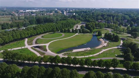 New redesigned Victory park in Riga, Latvia with a pond and pedestrian ...