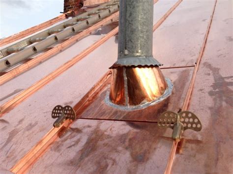 Traditional Standing Seam Copper Roofing Installation On Brick Building