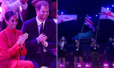 Duke And Duchess Of Sussex Clap Enthusiastically As British Flag Is