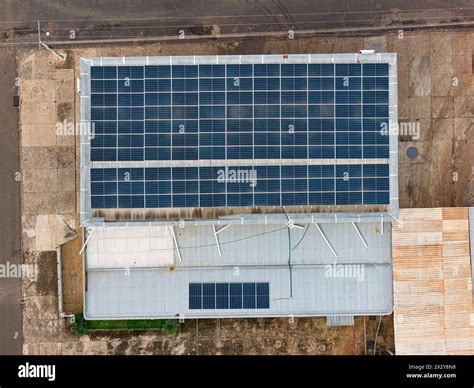 Metal Roof Of Industrial Establishment With Many Solar Panels Stock