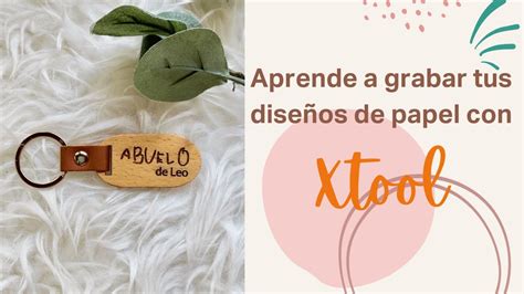 Aprende a grabar un diseño hecho en un papel a un llavero de madera con