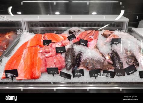 Seafood In Fish Shop Fridge Display Case Stock Photo Alamy