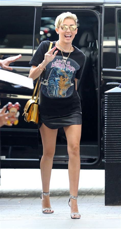 Miley Cyrus Flashes Her Panties In London Photos Global Grind Miley Miley Cyrus Wardrobe