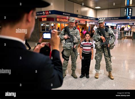 Jtf Empire Shield Members Pose For Pictures With Tourists At Penn