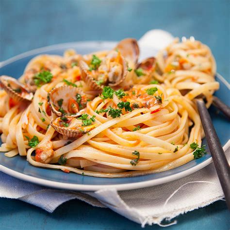 Recette Linguines aux coques et concassée de tomate