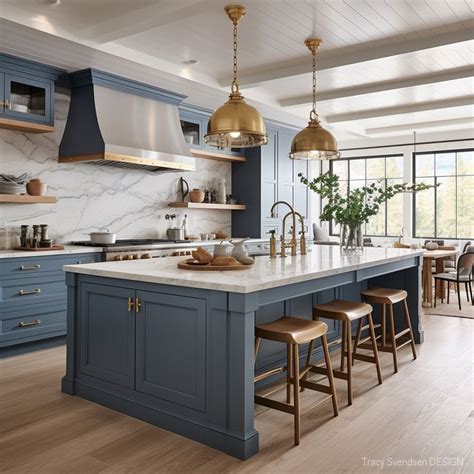 A Large Kitchen With Blue Cabinets And Marble Counter Tops Gold