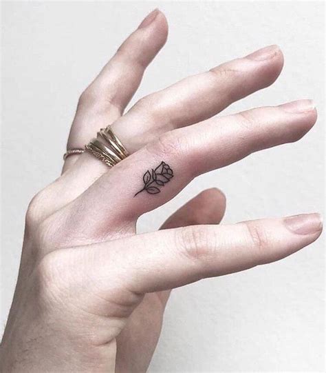 finger tattoo little rose | Tiny Tattoo inc.