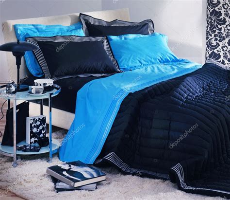 Modern blue-black bedroom Stock Photo by ©nastazia 9153501