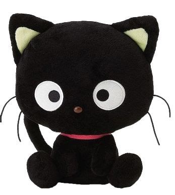 a black cat stuffed animal with big eyes