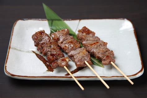 Beef yakitori skewers stock photo. Image of plate, sauce - 91949092