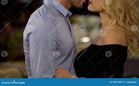 Seductive Blond Woman Petting Boyfriend Couple Hugging Love