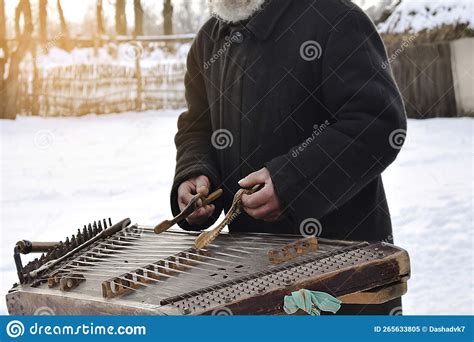 Man Playing National Traditional Ukrainian Folk Dulcimer Tsymbaly