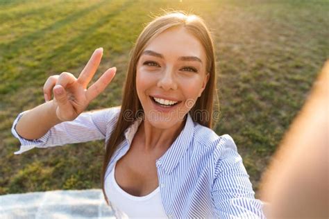 Close Up Of A Cheerful Young Woman Taking A Selfie Stock Image Image