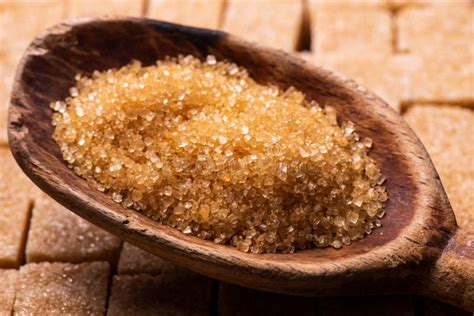 Crystals of Raw Cane Sugar, Macro in the Foreground Stock Photo - Image of plate, ingredient ...