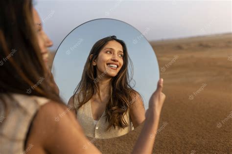 Premium Photo Side View Smiley Woman Holding Mirror