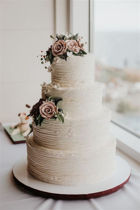 Textured Ivory Wedding Cake With Fondant Roses