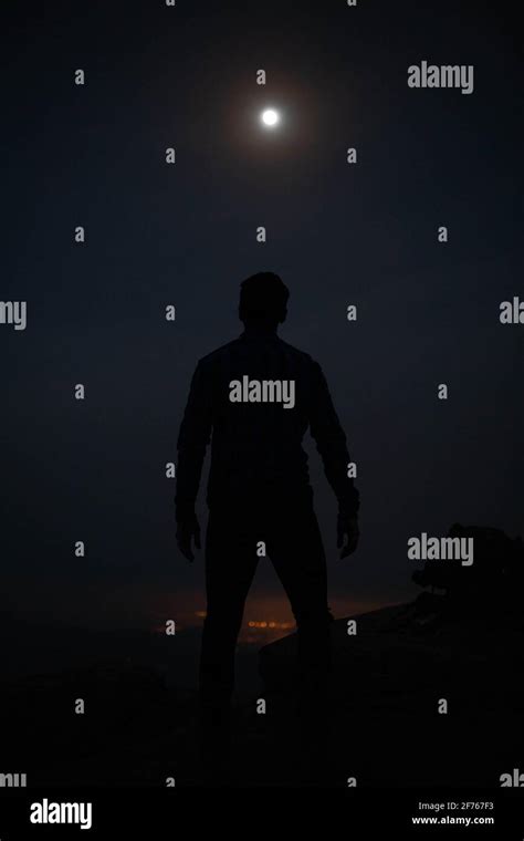 Man Looking At The Moon Stock Photo Alamy