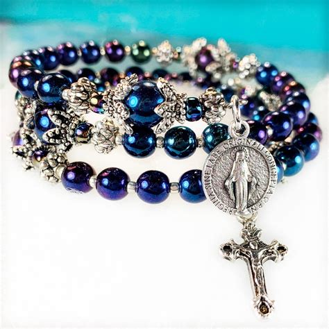 Rosary Wrap Bracelet With Blue Iris Color Czech Druk Beads And Featuring A Tiny Miraculous Medal