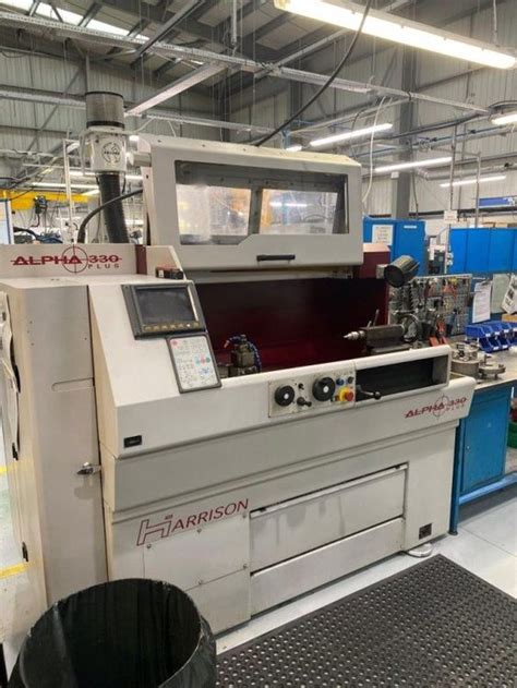 Harrison Fanuc Control 3500 Rpm Alpha 330 CNC Lathe 2 Axis