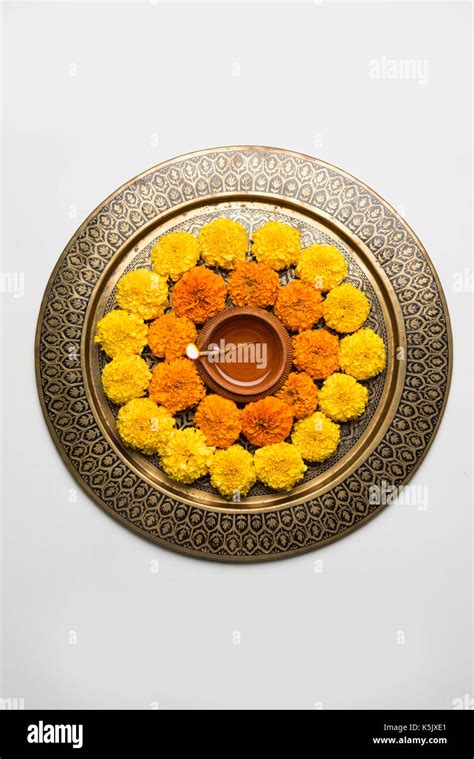 Flower Rangoli For Diwali Or Pongal Or Onam Made Using Marigold Or