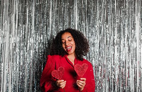 Woman Dancing And Partying With Hearts By Stocksy Contributor