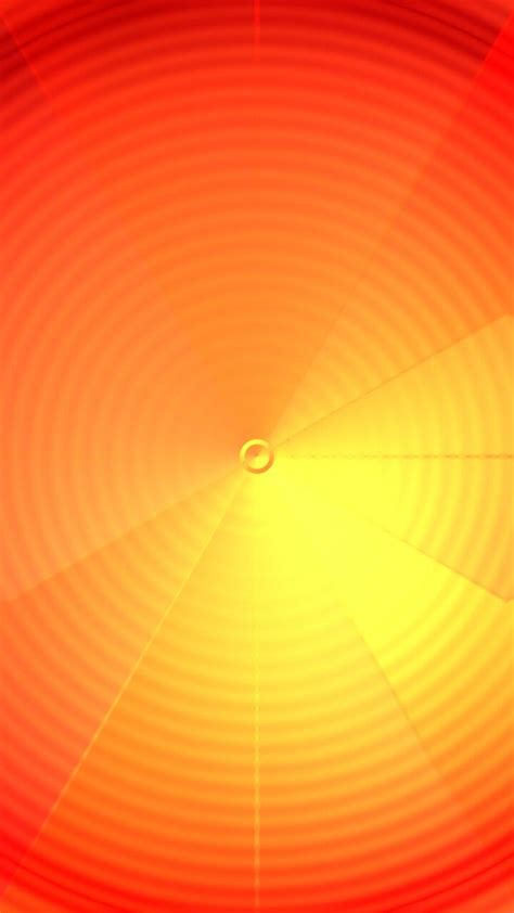 An Orange And Yellow Background With Some Light Coming From The Center