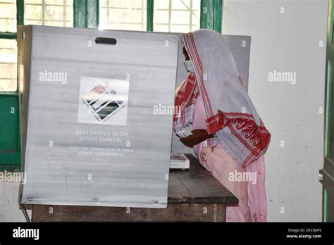 A Women Voters Casting Ballot In The First Phase Of Polling For Assam