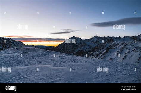 Snowy mountain during sunrise Stock Photo - Alamy