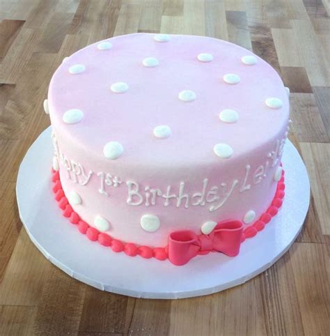 Pink Cake With White Polka Dots And Pink Bow — Trefzgers Bakery Cake