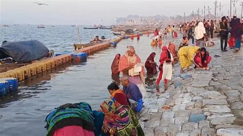 Magh Mela Devotees Return After Taking Bath In Triveni Sangam In