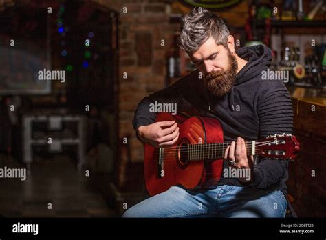 Bearded Guitarist Plays Play The Guitar Beard Hipster Man Sitting In