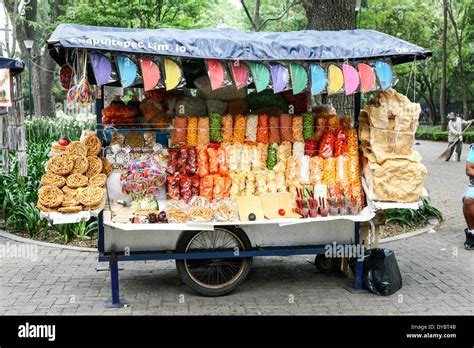 colorful street food cart displays attractively packaged junk food ...