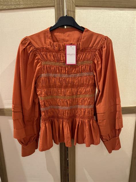 Blusa Nido De Abeja Combinada Naranja