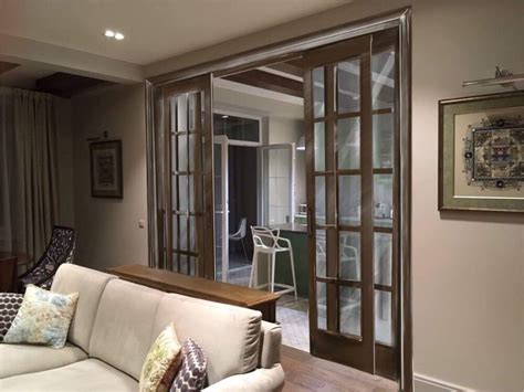 Раздвижные двери между кухней и гостиной для разделения и красоты, 26 фото