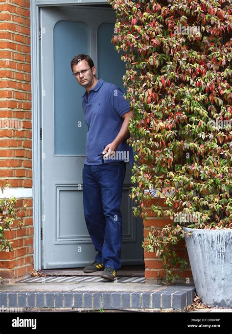 Former News of the World editor Andy Coulson leaves his home to go out ...