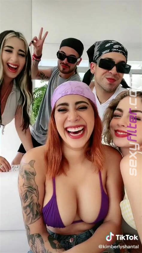 Sweetie Kim Shantal Shows Cleavage In Violet Bikini Top Sexyfilter