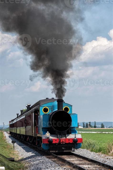 steam engine train while coming to you 20180196 Stock Photo at Vecteezy