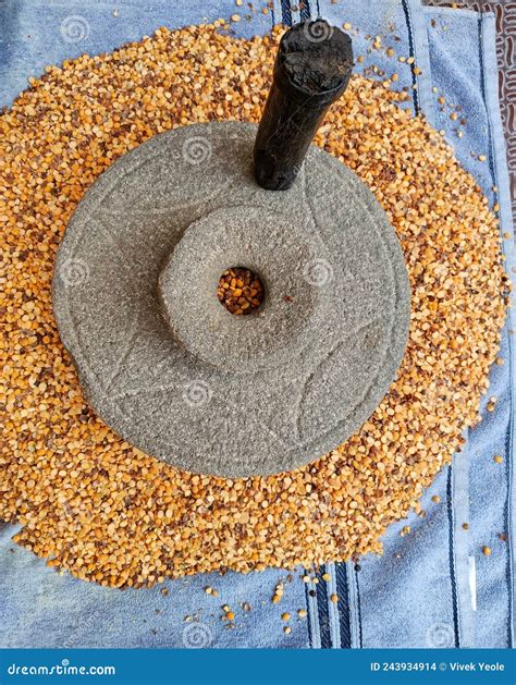 The Ancient Hand Mill Or Quern Stone Grinds The Grain Into Flour Old