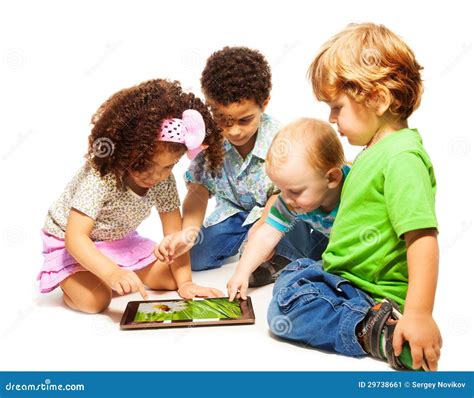 Four Little Kids Playing Tablet Stock Image Image 29738661