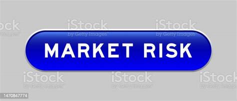 Blue Color Capsule Shape Button With Word Market Risk On Gray