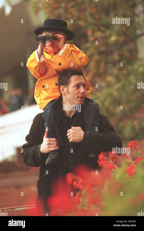 A father and his son playing sports Stock Photo - Alamy