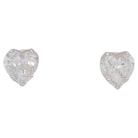 Boucles D Oreilles En Or Blanc Serties De Diamants En Serti Invisible