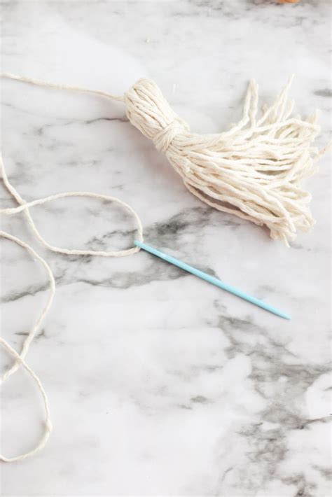 Easy Diy Make A Wood Bead Garland With Tassels The Sweetest Digs