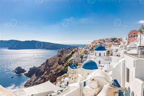 Famous Blue Dome Churches In Oia Santorini Greece In The Morning