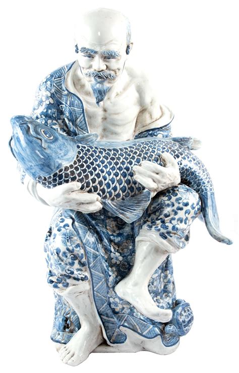 Blue And White Chinese Porcelain Man And Fish Sculpture At 1stdibs