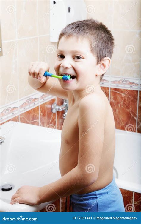 Funny kid brushing teeth stock image. Image of teeth - 17351441